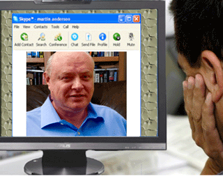 Valéry Fradkov works with a client 
						via video conferencing